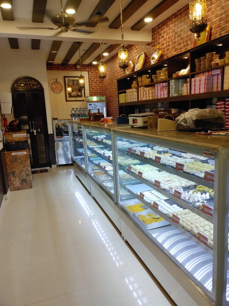 A well-designed sweet shop interior can significantly boost customer engagement and enhance brand value. With Near Me Interiors, you get a perfect blend of tradition, functionality, and luxury, ensuring an immersive shopping experience for your customers. If you're planning to revamp or set up a sweet shop or bakery, let us help you create an extraordinary space that stands out.